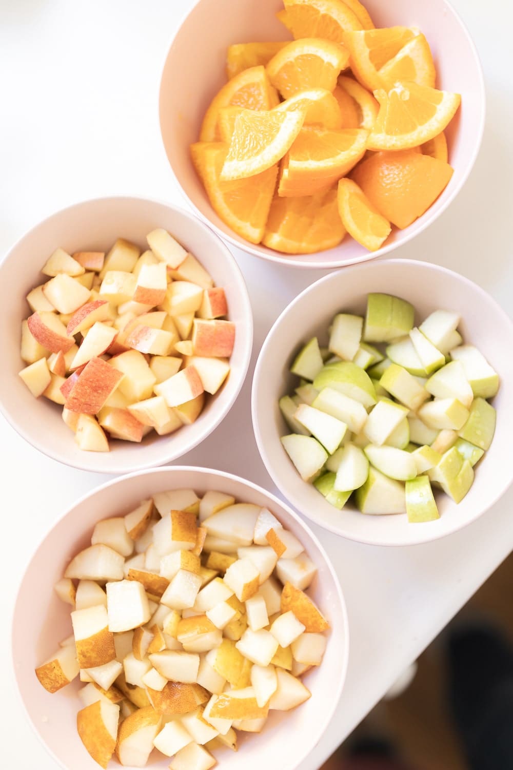 Chopped fall fruit for blogger Stephanie Ziajka's fall apple sangria on Diary of a Debutante Chopped fall fruit for blogger Stephanie Ziajka's fall apple sangria on Diary of a Debutante
