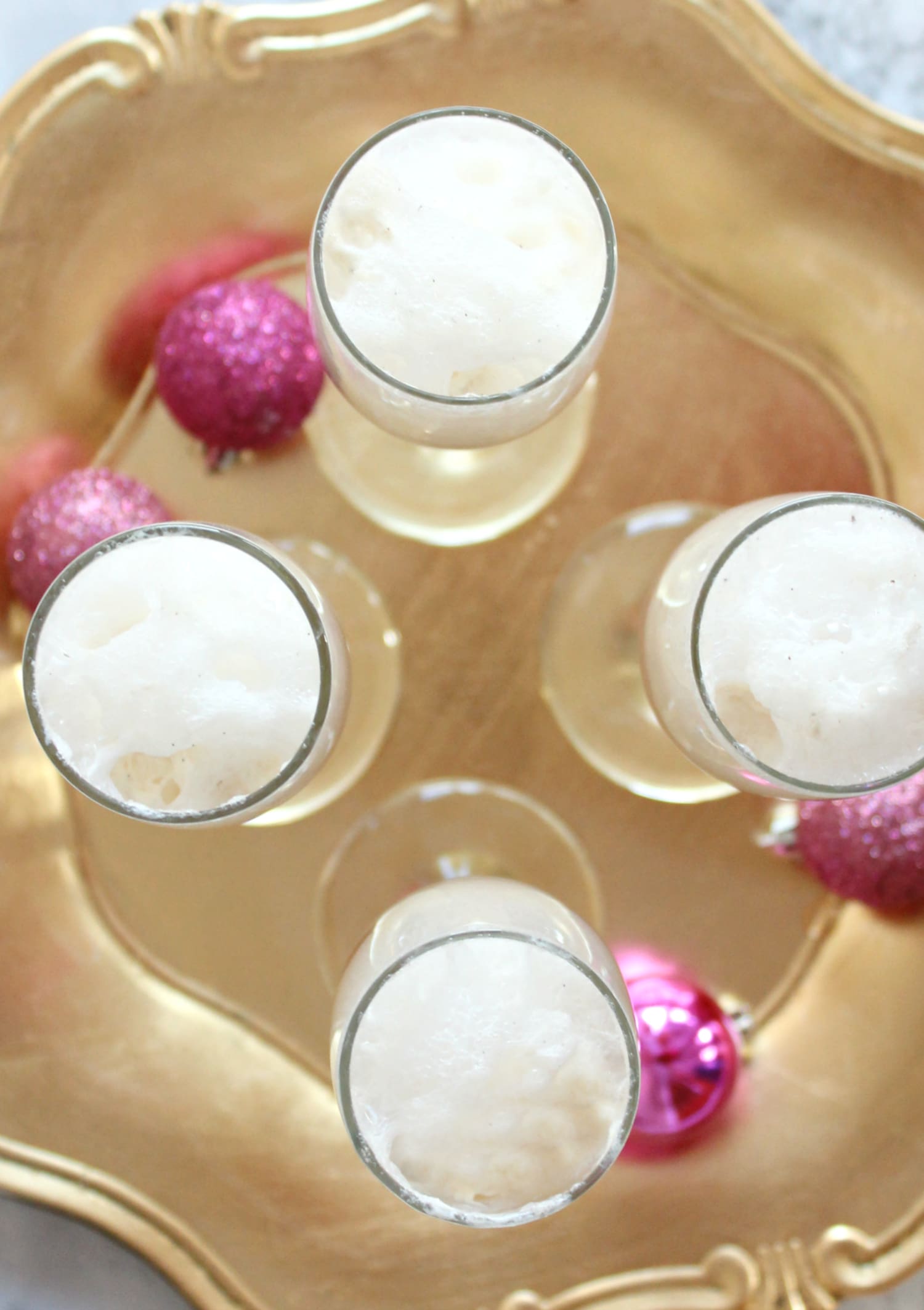 This delicious Raspberry Champagne Float cocktail is perfect for the holidays!