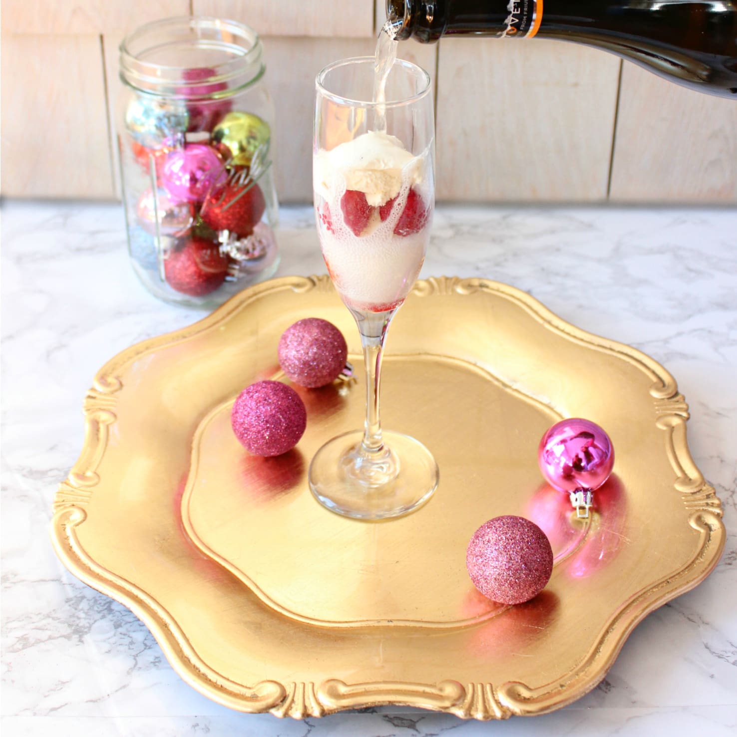 This delicious Raspberry Champagne Float cocktail is perfect for the holidays!