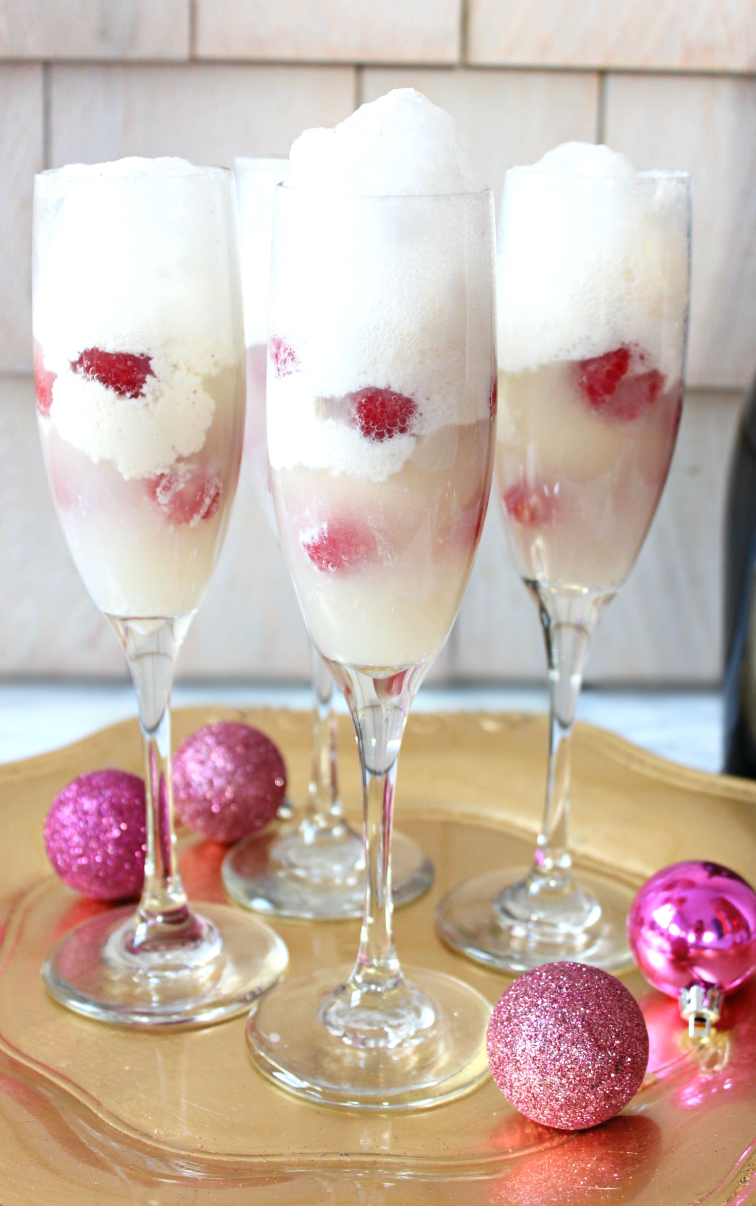 This delicious Raspberry Champagne Float cocktail is perfect for the holidays!