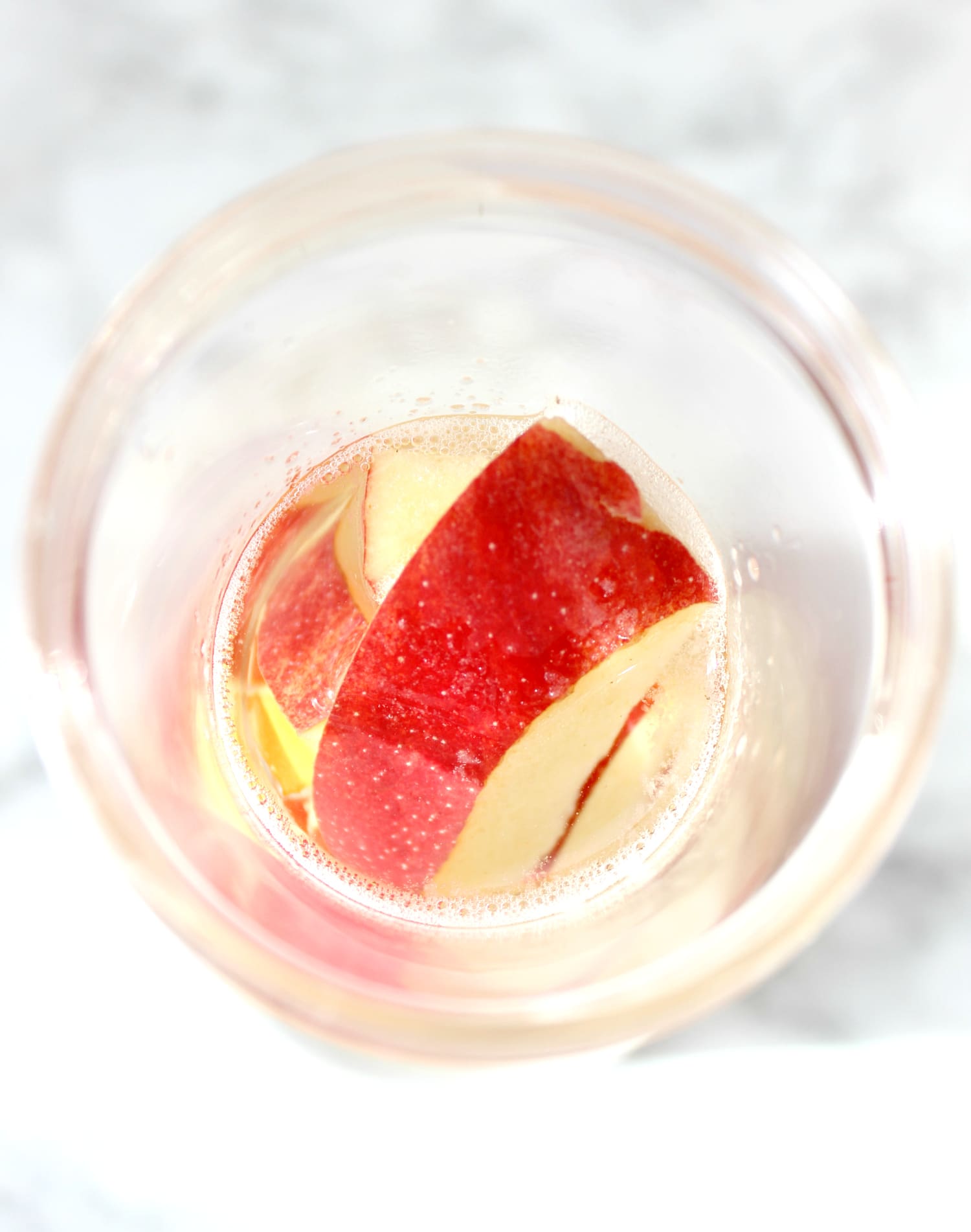 This cinnamon apple pear fall detox water is a must-try this holiday season for warding off stomach aches and holiday sugar highs!