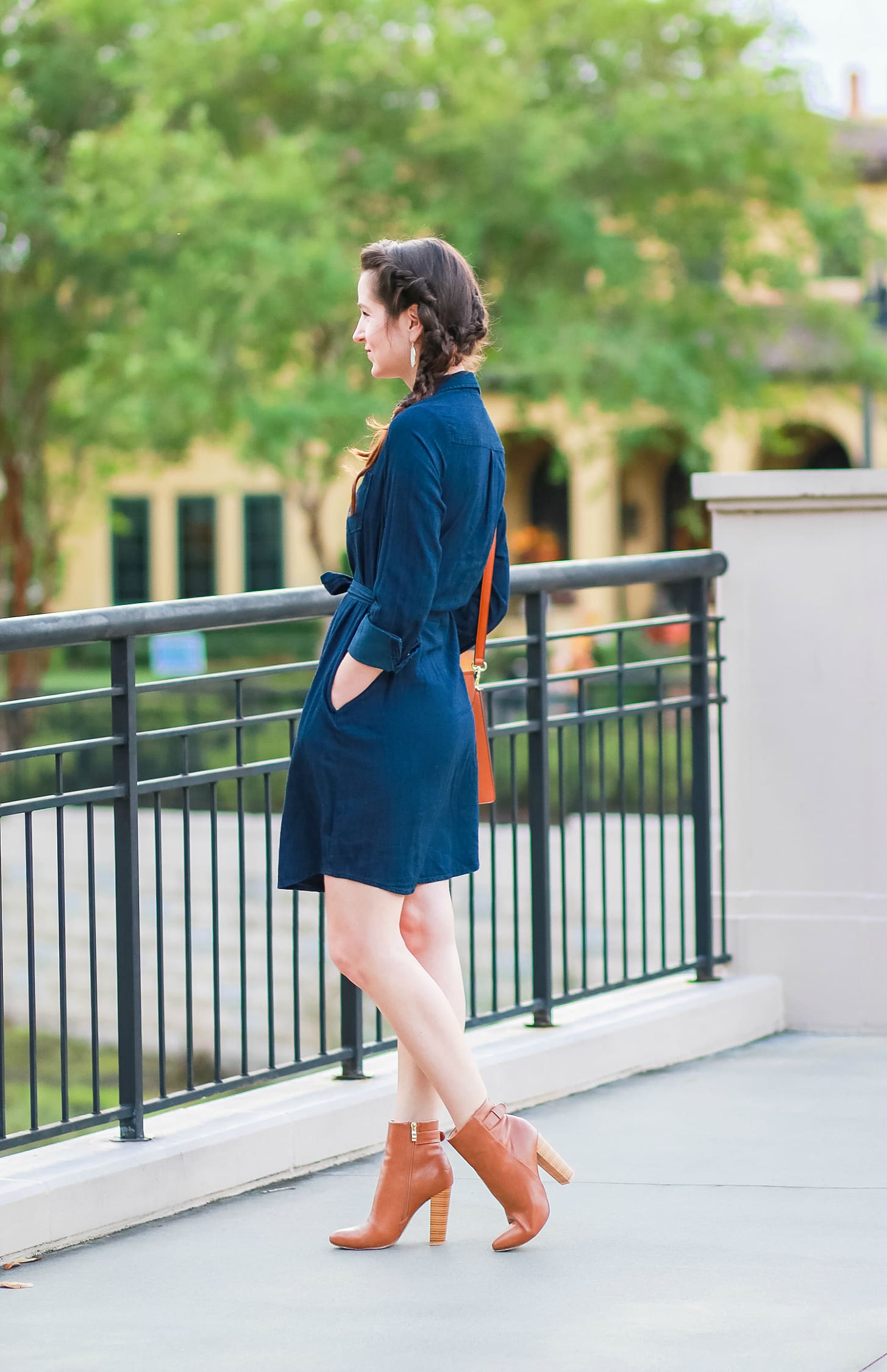 Cute casual tailgating outfit and easy side braid hairstyle | Twisted side braid hair tutorial | Target denim shirt dress with cognac booties, a Chleo Faye lookalike bag, and monogrammed jewelry | Fall Hairstyle to Try: Simple Twisted Side Braid from Hair Cuttery by southern blogger Stephanie Ziajka from Diary of a Debutante