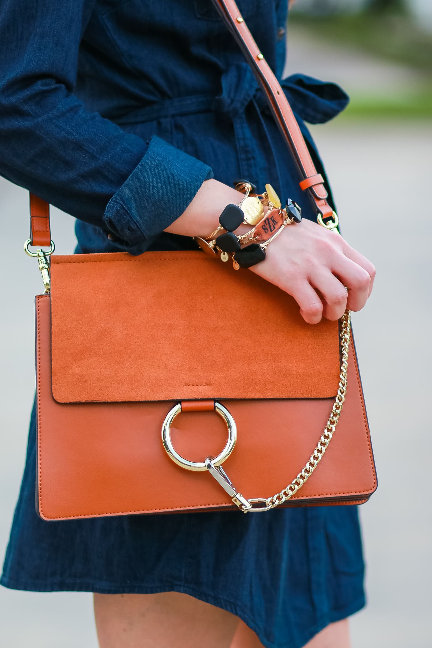 Cute casual tailgating outfit and easy side braid hairstyle | Twisted side braid hair tutorial | Target denim shirt dress with cognac booties, a Chleo Faye lookalike bag, and monogrammed jewelry | Fall Hairstyle to Try: Simple Twisted Side Braid from Hair Cuttery by southern blogger Stephanie Ziajka from Diary of a Debutante