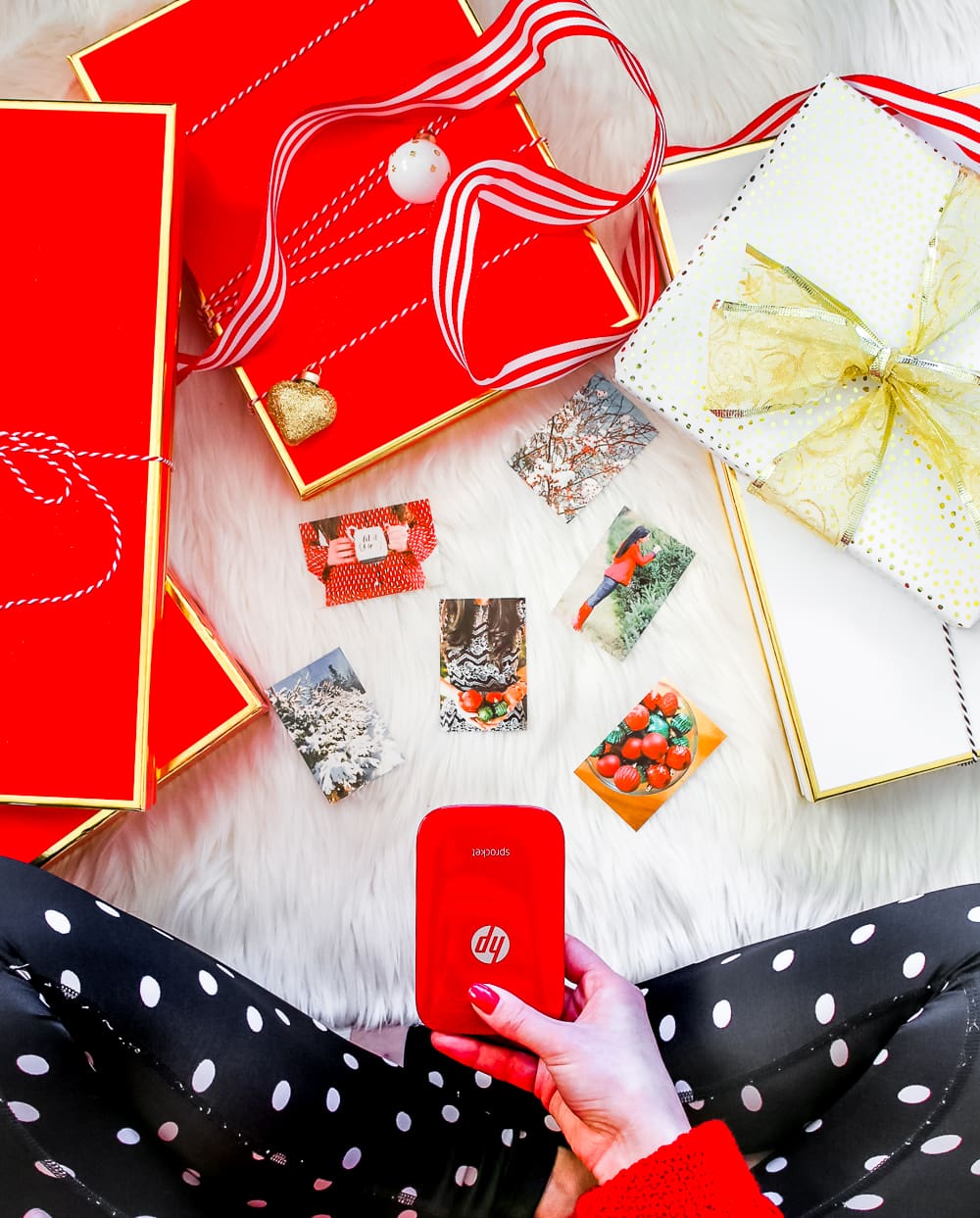 Red HP Sprocket Photo Printer, which makes a perfect stocking stuffer and is the best instant photo printer for events and travel by southern blogger Stephanie Ziajka from Diary of a Debutante