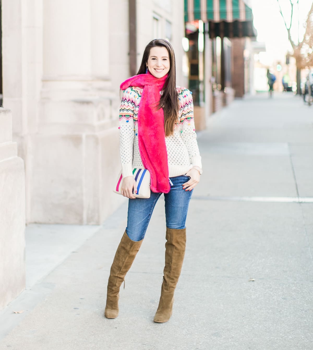 Colorful Christmas sweater ideas from Talbots, featuring their Carnival Fair Isle Sweater, Pink Faux Fur Pull Through Scarf, and Canvas Stripe Makeup Pouch styled with AG the Legging ankle jeans, taupe Free People Liberty boots, and cognac Kendra Scott Skylar earrings by southern fashion blogger Stephanie Ziajka from Diary of a Debutante Colorful Christmas sweater ideas from Talbots, featuring their Carnival Fair Isle Sweater, Pink Faux Fur Pull Through Scarf, and Canvas Stripe Makeup Pouch styled with AG the Legging ankle jeans, taupe Free People Liberty boots, and cognac Kendra Scott Skylar earrings by southern fashion blogger Stephanie Ziajka from Diary of a Debutante