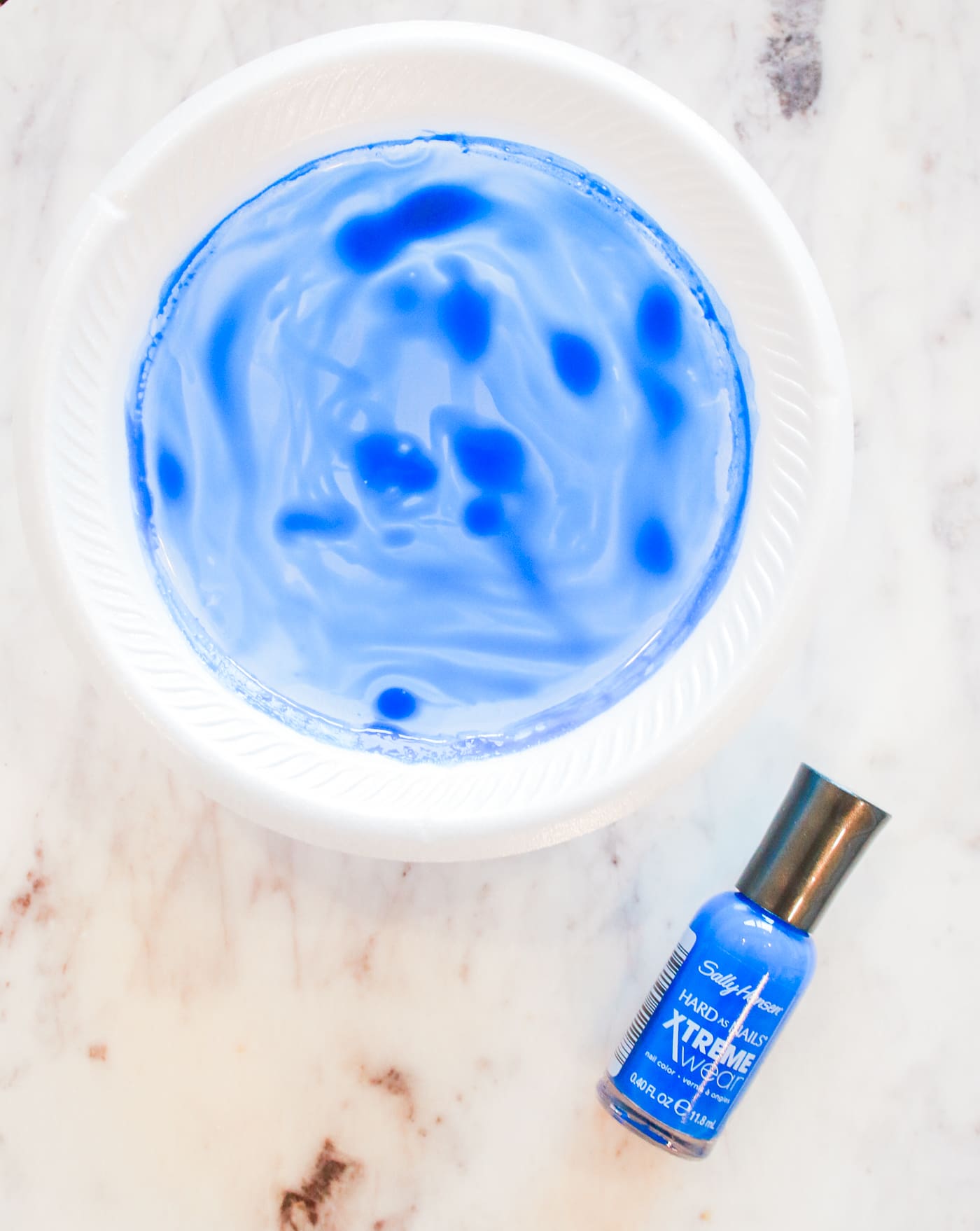 Easter Flair: DIY Blue Marbled Easter Eggs by southern lifestyle blogger Stephanie Ziajka from Diary of a Debutante, Southern Living projects, marbled easter eggs, nail polish easter eggs, diy marbled easter eggs, blue marbled easter eggs