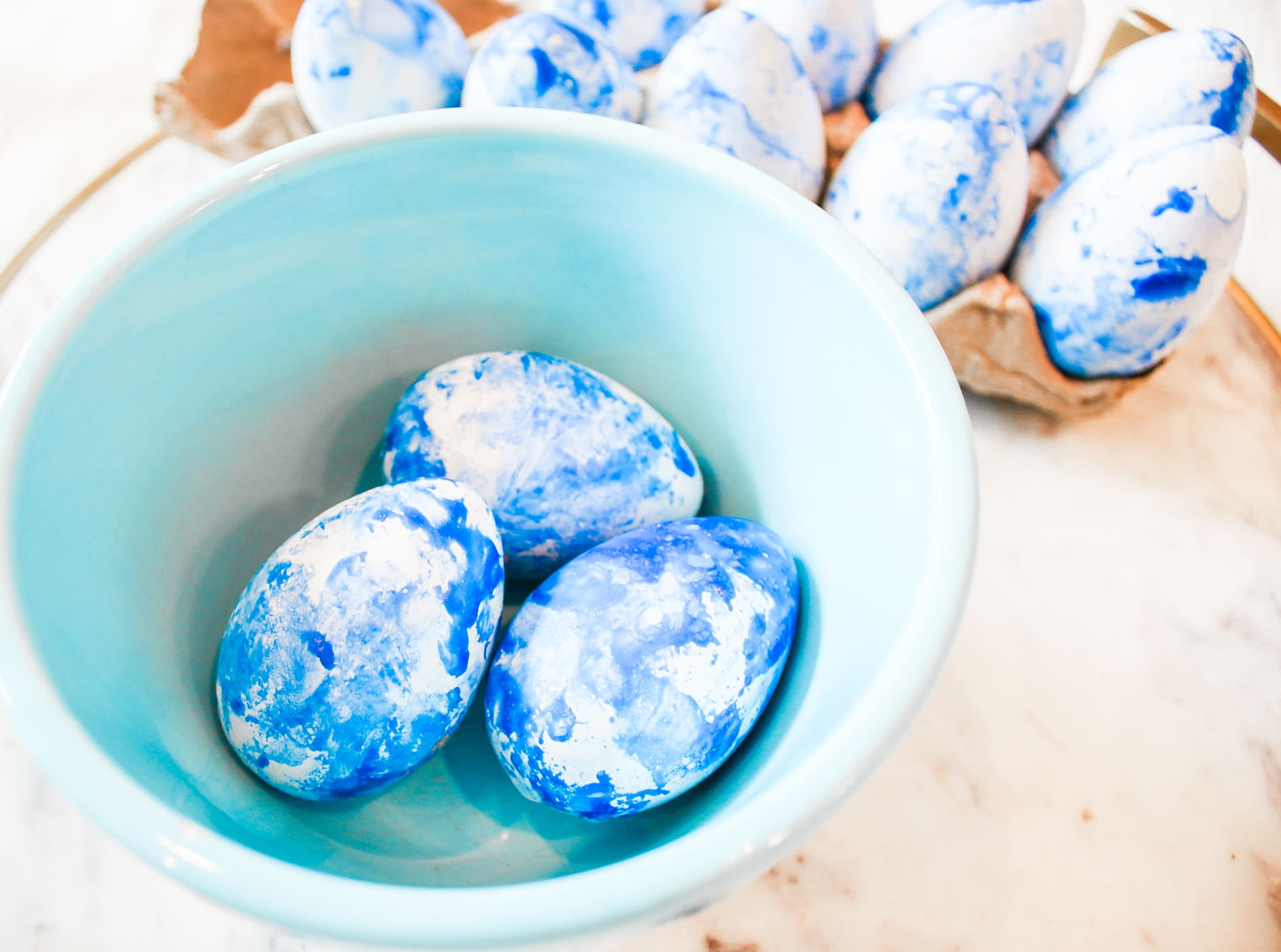 Easter Flair: DIY Blue Marbled Easter Eggs by southern lifestyle blogger Stephanie Ziajka from Diary of a Debutante, Southern Living projects, marbled easter eggs, nail polish easter eggs, diy marbled easter eggs, blue marbled easter eggs