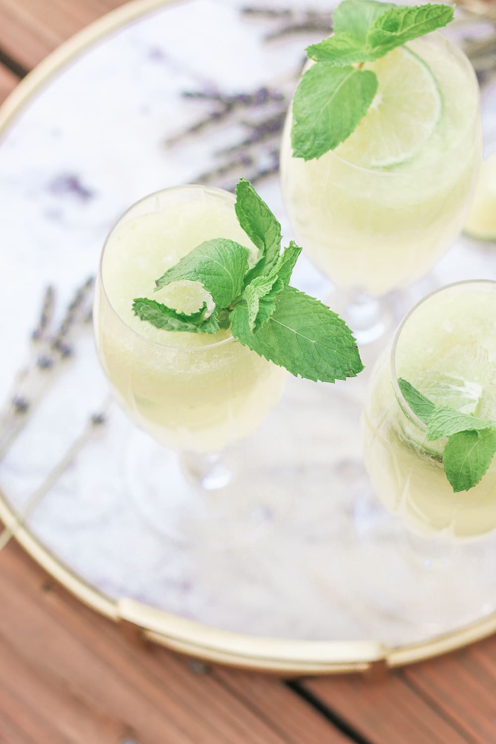 Cucumber Mocktail Recipe for Summer: Cucumber-Lime-Lavender Spritzer by southern lifestyle blogger Stephanie Ziajka from Diary of a Debutante, cucumber mocktail recipes, edible lavender cocktail recipe, Cooking Light mocktail recipes, summer mocktail ideas Cucumber Mocktail Recipe for Summer: Cucumber-Lime-Lavender Spritzer by southern lifestyle blogger Stephanie Ziajka from Diary of a Debutante, cucumber mocktail recipes, edible lavender cocktail recipe, Cooking Light mocktail recipes, summer mocktail ideas