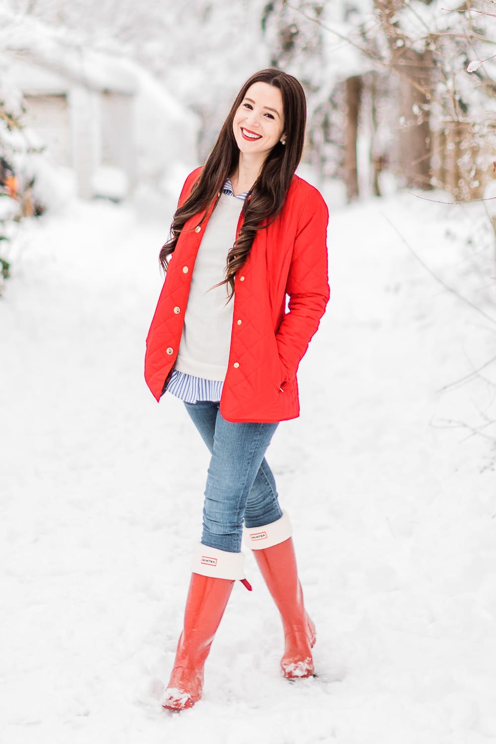 Preppy Winter Outfit: Red Quilted Jacket with Matching Red Hunter Boots by affordable fashion blogger Stephanie Ziajka from Diary of a Debutante, how to style red Hunter boots with tall welly boot socks, how to style a red quilted jacket, red quilted jacket styled with red tall Hunter boots, Hunter tall welly boot socks, a blue striped oxford, white crewneck sweater, and skinny jeans Preppy Winter Outfit: Red Quilted Jacket with Matching Red Hunter Boots by affordable fashion blogger Stephanie Ziajka from Diary of a Debutante, how to style red Hunter boots with tall welly boot socks, how to style a red quilted jacket, red quilted jacket styled with red tall Hunter boots, Hunter tall welly boot socks, a blue striped oxford, white crewneck sweater, and skinny jeans
