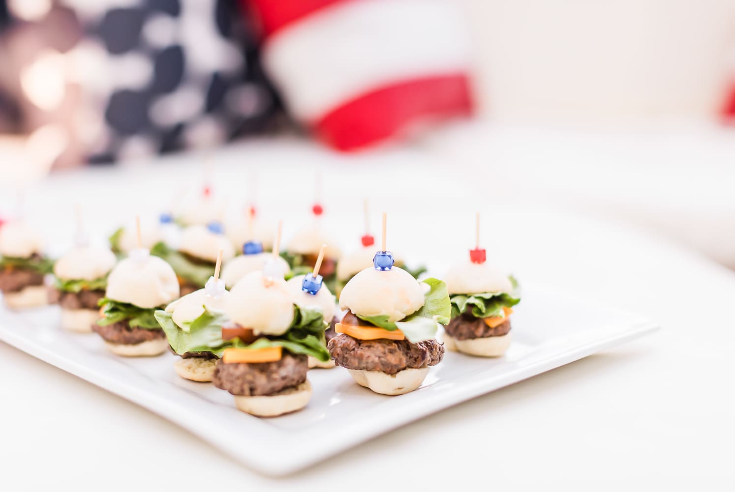 Itty Bitty Mini Cheeseburgers: The Perfect Summer Appetizer by popular Missouri blogger Stephanie Ziajka on Diary of a Debutante, 4th of July mini cheeseburger appetizer, Missouri beef appetizer, simple 4th of July appetizers, red white and blue party picks Itty Bitty Mini Cheeseburgers: The Perfect Summer Appetizer by popular Missouri blogger Stephanie Ziajka on Diary of a Debutante, 4th of July mini cheeseburger appetizer, Missouri beef appetizer, simple 4th of July appetizers, red white and blue party picks