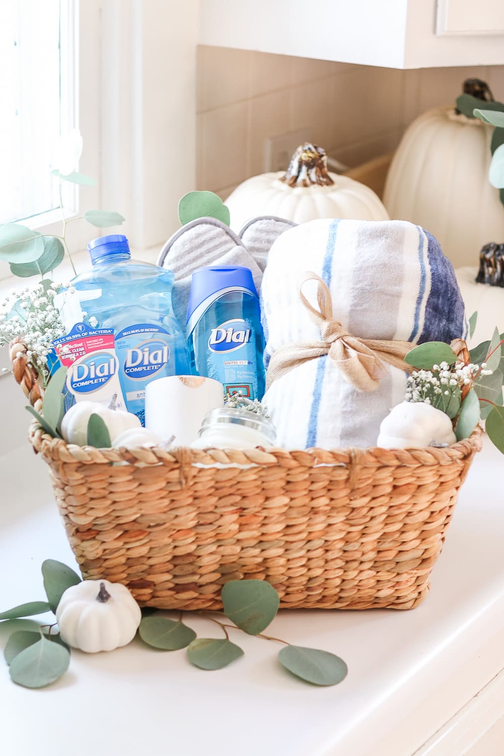 Practical Gift Basket Idea for Teachers, New Moms, and Volunteers by popular affordable entertaining blogger Stephanie Ziajka on Diary of a Debutante, eucalyptus in a gift basket, decorating gift basket with eucalyptus Practical Gift Basket Idea for Teachers, New Moms, and Volunteers by popular affordable entertaining blogger Stephanie Ziajka on Diary of a Debutante, eucalyptus in a gift basket, decorating gift basket with eucalyptus