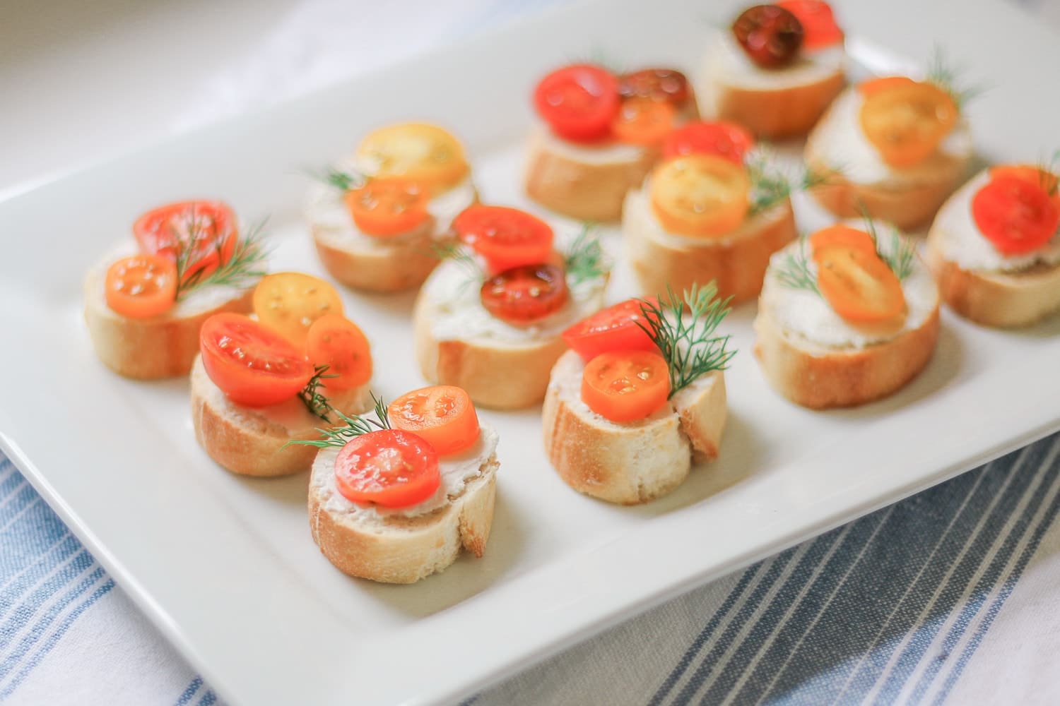 Southern lifestyle blogger Stephanie Ziajka shares a colorful tomato and goat cheese crostini recipe using NatureSweet Constellation tomatoes on Diary of a Debutante Southern lifestyle blogger Stephanie Ziajka shares a colorful tomato and goat cheese crostini recipe using NatureSweet Constellation tomatoes on Diary of a Debutante