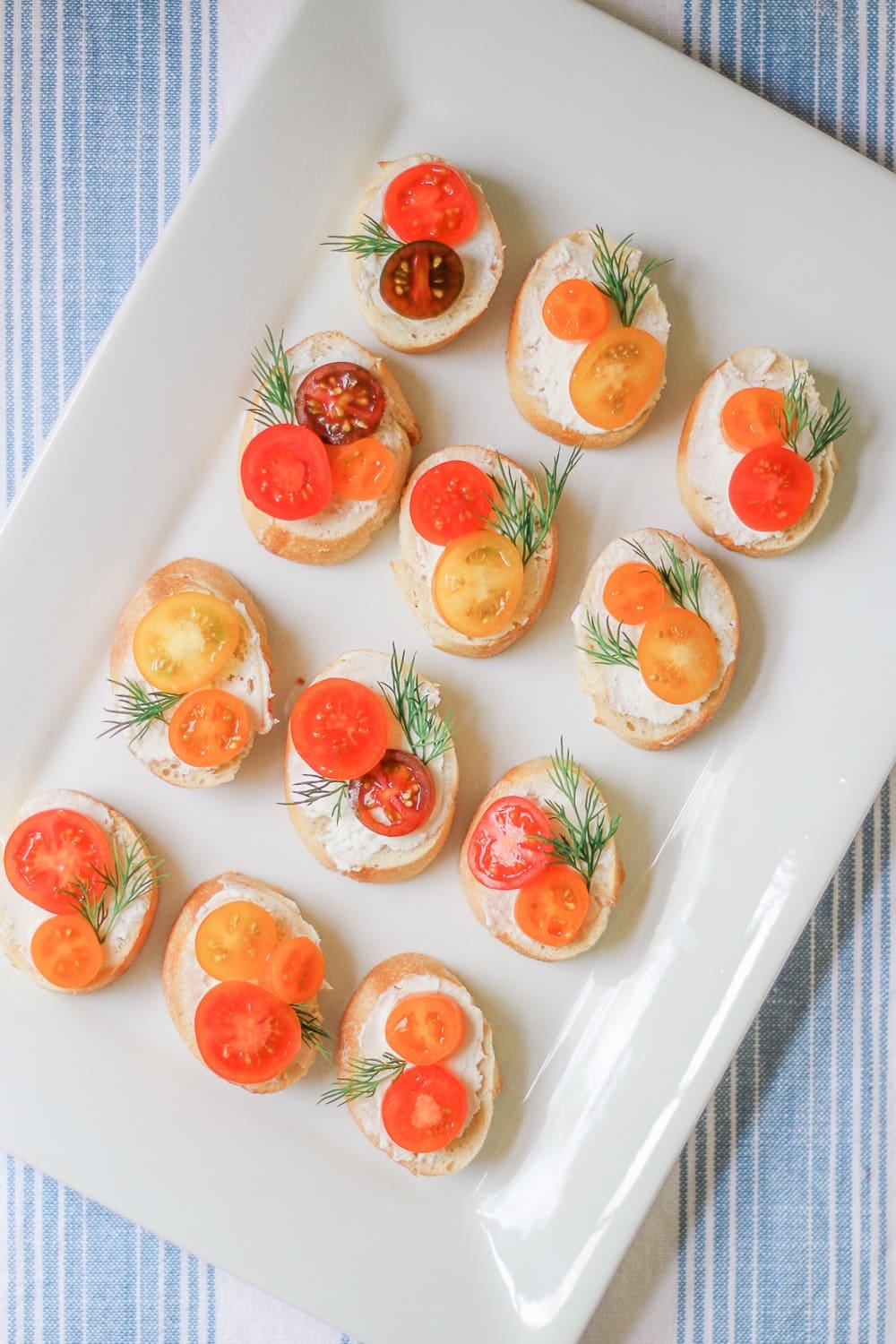 Tomato and goat cheese crostinis by southern lifestyle blogger Stephanie Ziajka of Diary of a Debutante Tomato and goat cheese crostinis by southern lifestyle blogger Stephanie Ziajka of Diary of a Debutante