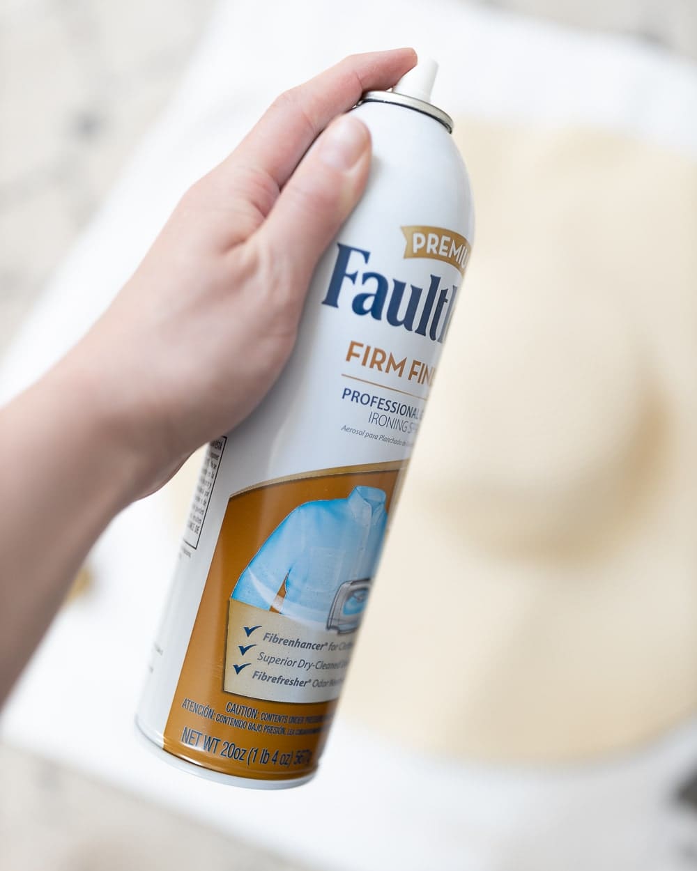 Blogger Stephanie Ziajka shows how to use starch spray to make a hat stiff again on Diary of a Debutante Blogger Stephanie Ziajka shows how to use starch spray to make a hat stiff again on Diary of a Debutante