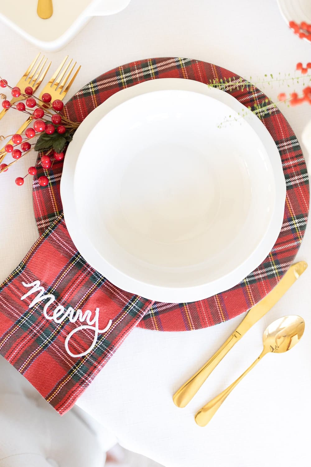 Mud Pie Christmas napkins and chargers styled in a Christmas tablescape by blogger Stephanie Ziajka on Diary of a Debutante Mud Pie Christmas napkins and chargers styled in a Christmas tablescape by blogger Stephanie Ziajka on Diary of a Debutante