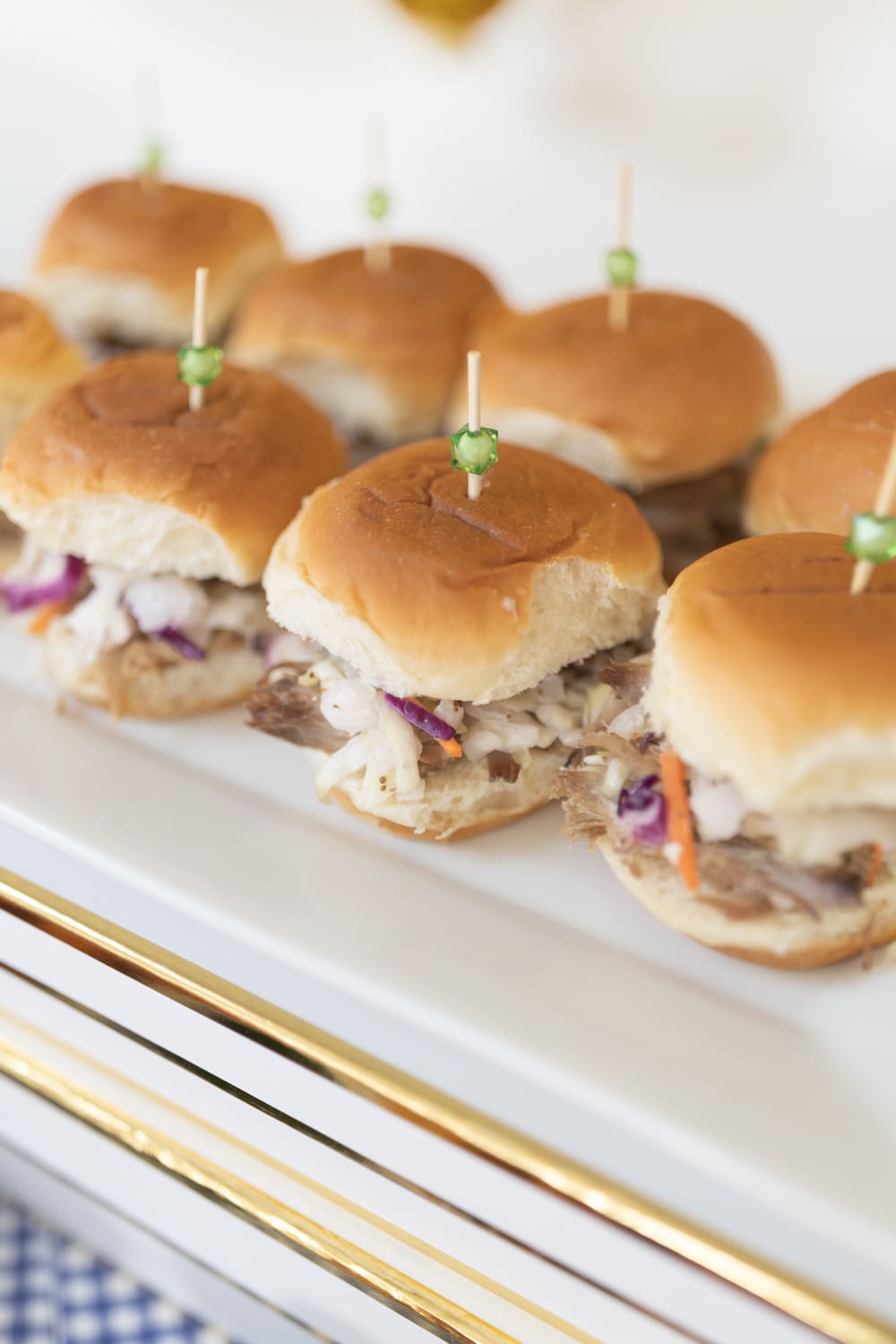 Pulled pork sliders cooked in a Crock Pot by blogger Stephanie Ziajka on Diary of a Debutante Pulled pork sliders cooked in a Crock Pot by blogger Stephanie Ziajka on Diary of a Debutante