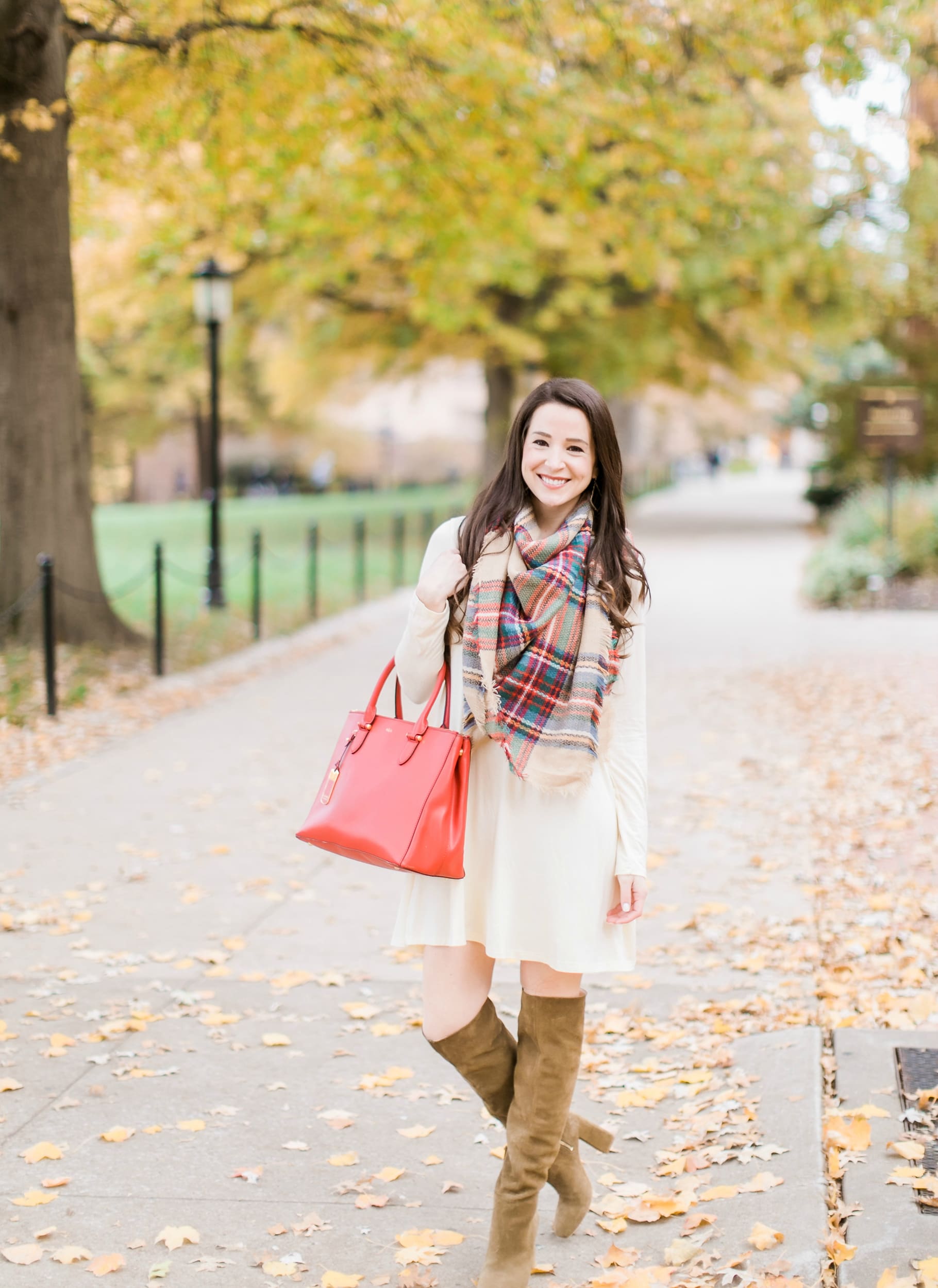Beige cotton swing dress with tartan blanket scarf, Free People cognac OTK boots, red Ralph Lauren handbag, and Kendra Scott Sophee earrings | Casual holiday outfit idea | 10 tips for looking your best on camera | Tips for Looking Your Best in Holiday Photos from fashion blogger Stephanie Ziajka of Diary of a Debutante Beige cotton swing dress with tartan blanket scarf, Free People cognac OTK boots, red Ralph Lauren handbag, and Kendra Scott Sophee earrings | Casual holiday outfit idea | 10 tips for looking your best on camera | Tips for Looking Your Best in Holiday Photos from fashion blogger Stephanie Ziajka of Diary of a Debutante