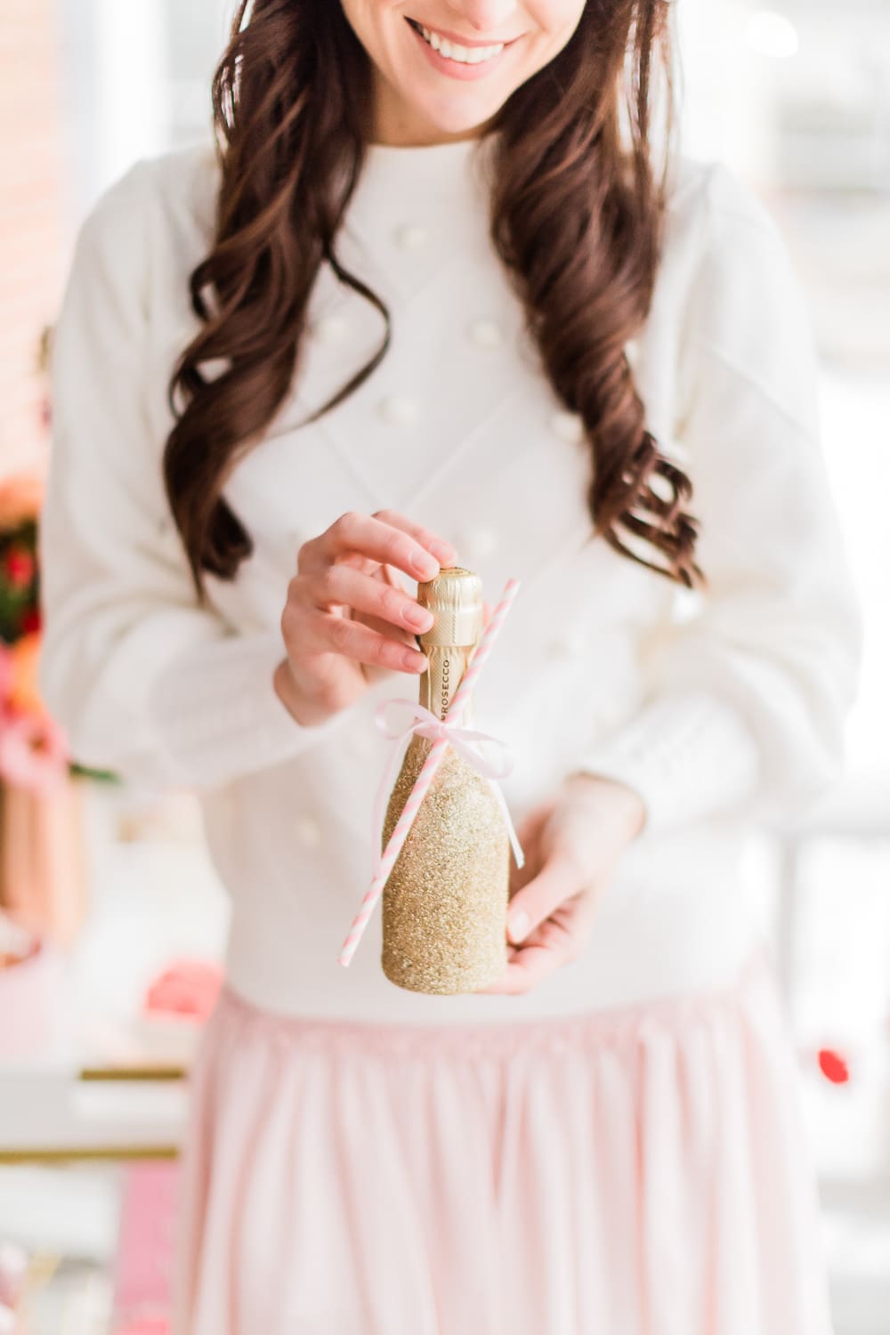 Southern lifestyle blogger Stephanie Ziajka shares a glitter champagne bottle tutorial using mini bottles of sparkling wine on Diary of a Debutante Southern lifestyle blogger Stephanie Ziajka shares a glitter champagne bottle tutorial using mini bottles of sparkling wine on Diary of a Debutante