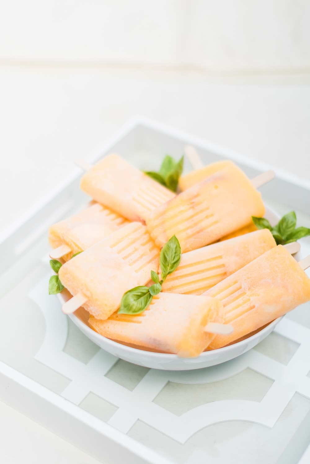 Boozy peach popsicles recipe by southern lifestyle blogger Stephanie Ziajka on Diary of a Debutante Boozy peach popsicles recipe by southern lifestyle blogger Stephanie Ziajka on Diary of a Debutante