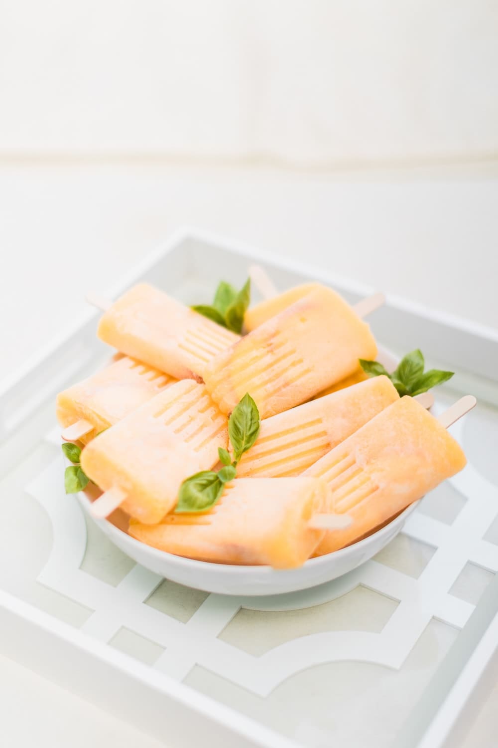 Boozy bellini ice pops made by southern lifestyle blogger Stephanie Ziajka on Diary of a Debutante Boozy bellini ice pops made by southern lifestyle blogger Stephanie Ziajka on Diary of a Debutante