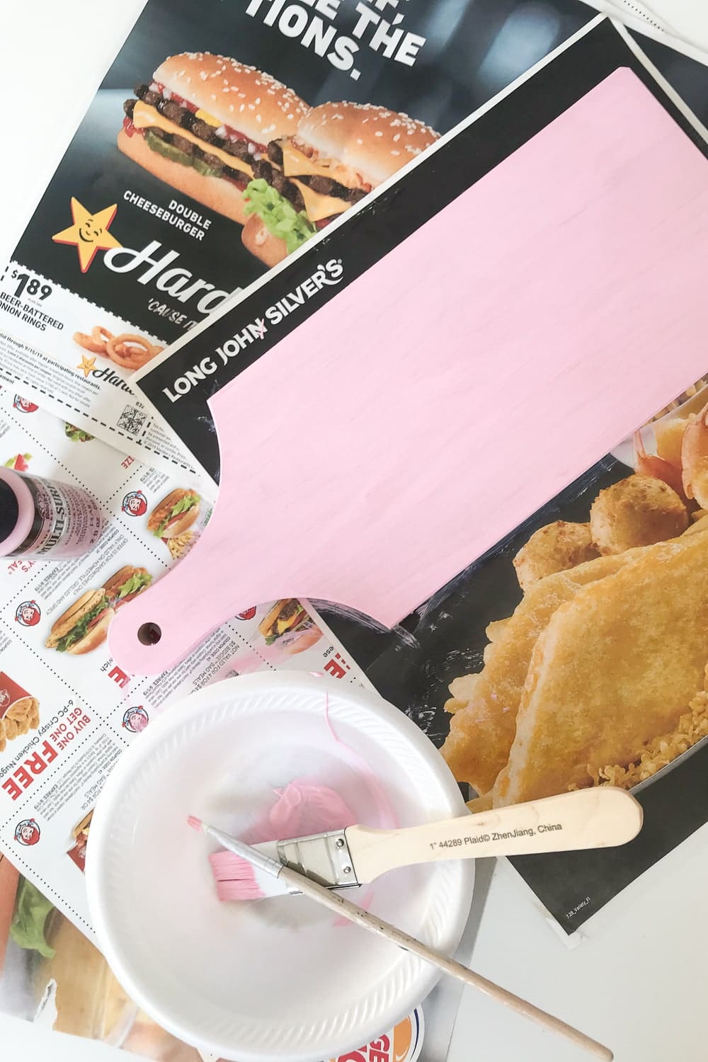 Blogger Stephanie Ziajka uses non-toxic pink acrylic paint to make her own personalized cheese board on Diary of a Debutante Blogger Stephanie Ziajka uses non-toxic pink acrylic paint to make her own personalized cheese board on Diary of a Debutante