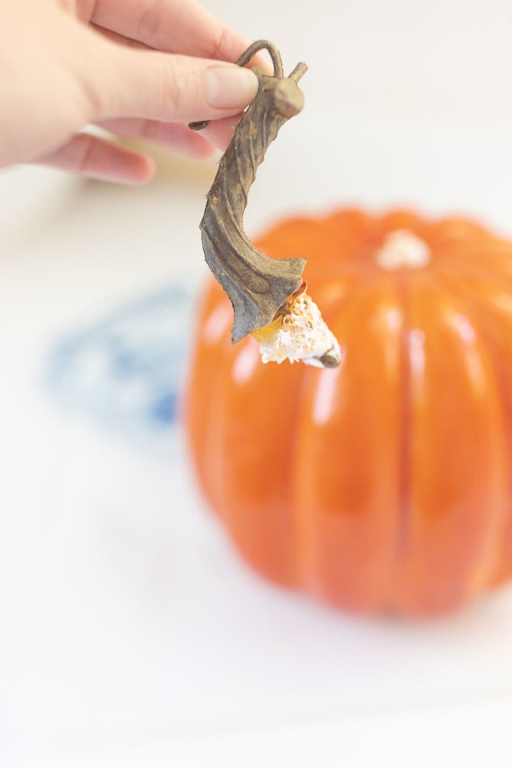 Step one of blogger Stephanie Ziajka's blue and white decoupage pumpkin tutorial on Diary of a Debutante Step one of blogger Stephanie Ziajka's blue and white decoupage pumpkin tutorial on Diary of a Debutante