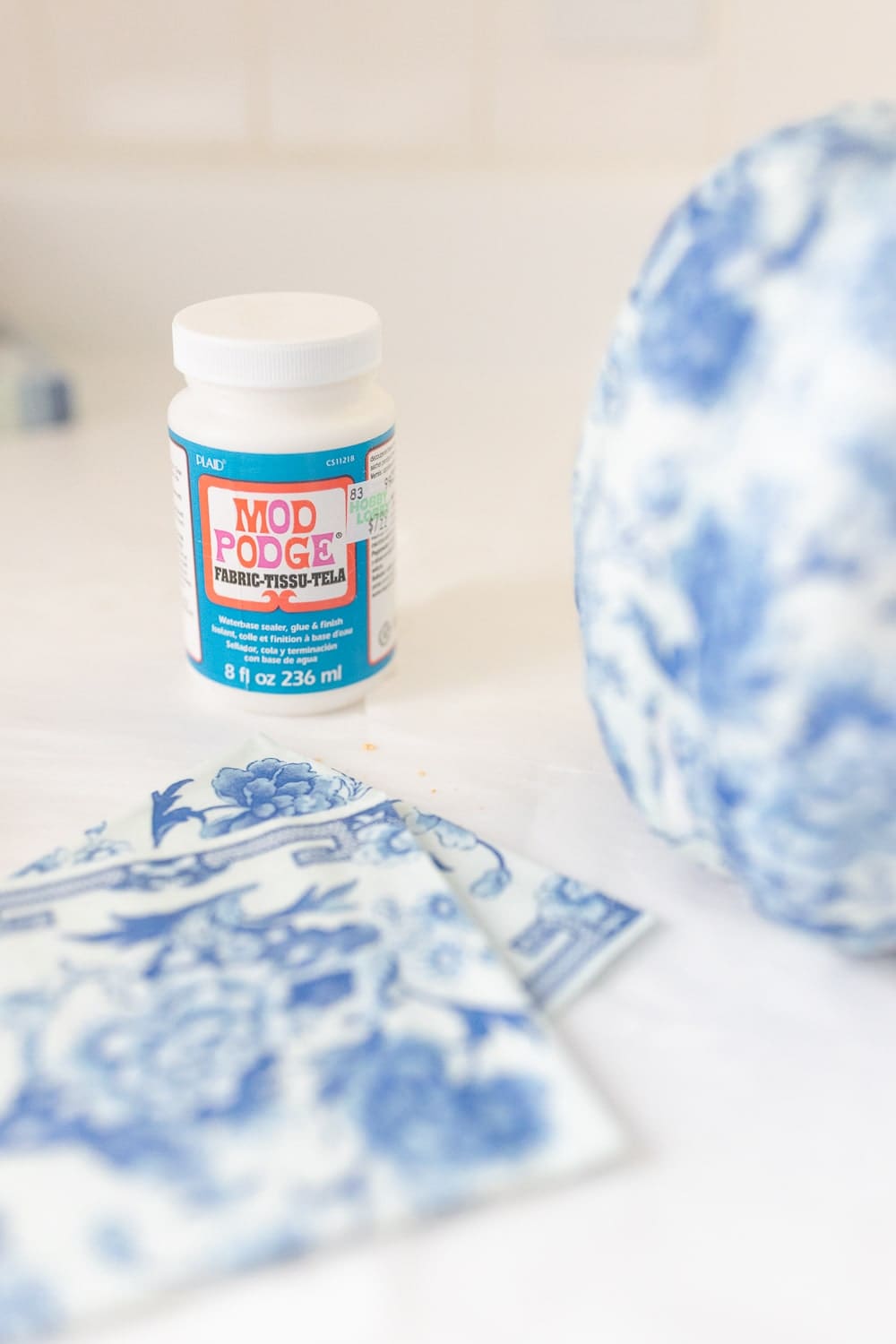 Blogger Stephanie Ziajka uses fabric Modge Podge for a napkin decoupage project on Diary of a Debutante Blogger Stephanie Ziajka uses fabric Modge Podge for a napkin decoupage project on Diary of a Debutante
